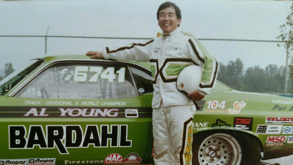 Al Young with green Dodge Challenger
