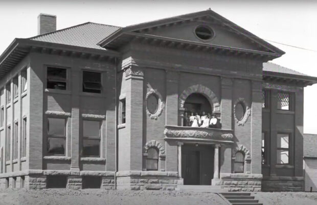 Historic black and white photo of exterior of the Carnegie Library in Seattle's Ballard neighborhood.