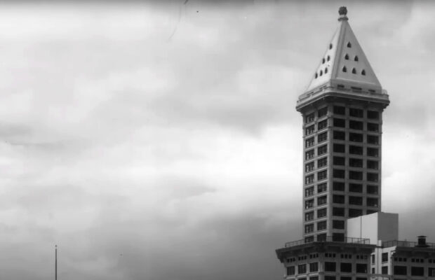 Historic black and white photo of the peak of the Smith Tower located in Seattle's Pioneer Square district.