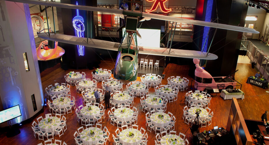 The Faye G. Allen Grand Atrium at MOHAI set up with banquet rounds.