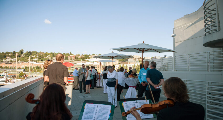 People enjoying music on the Stack Family Lakeview Terrace.