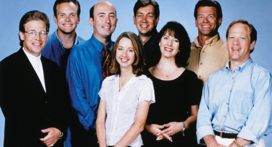 Almost Live! cast in 1997, from left to right: Steve Wilson, Joel McHale, John Keister, Nancy Guppy, Bob Nelson, Tracey Conway, Pat Cashman, and Bill Stainton. Courtesy of KING 5.