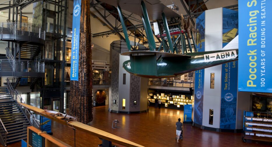 The Grand Atrium at MOHAI where both the Boeing B-1 airplane and Pocock Racing Shell hang side-by-side.