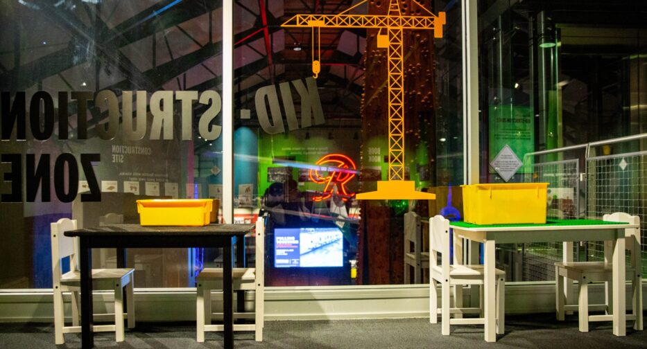 Two children sized tables with chairs in the Kid-Struction Zone Exhibit at MOHAI.