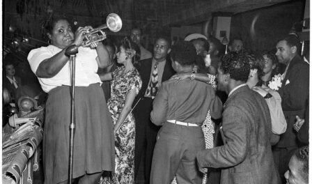 A crowd dances while the International Sweethearts of Rhythm female jazz band performs, September 1944.
