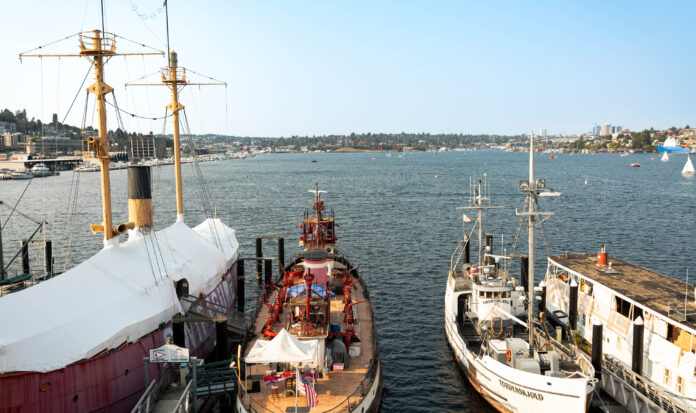 Four ships docked on Lake Union in downtown Seattle.