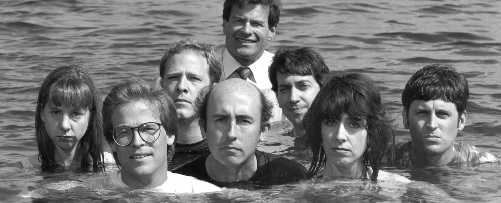 Almost Live! cast in a lake...not smiling.