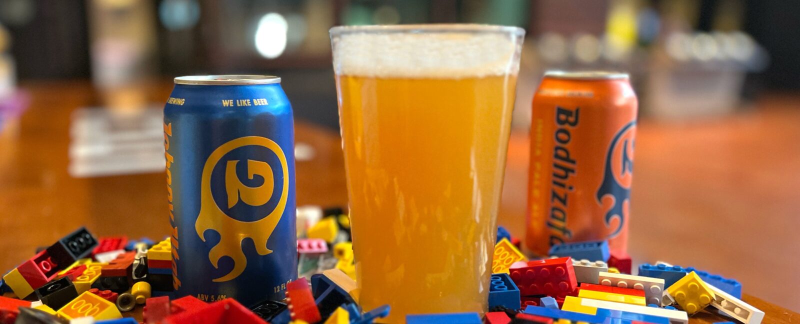 Georgetown Brewing beer nestled among colorful LEGO bricks.