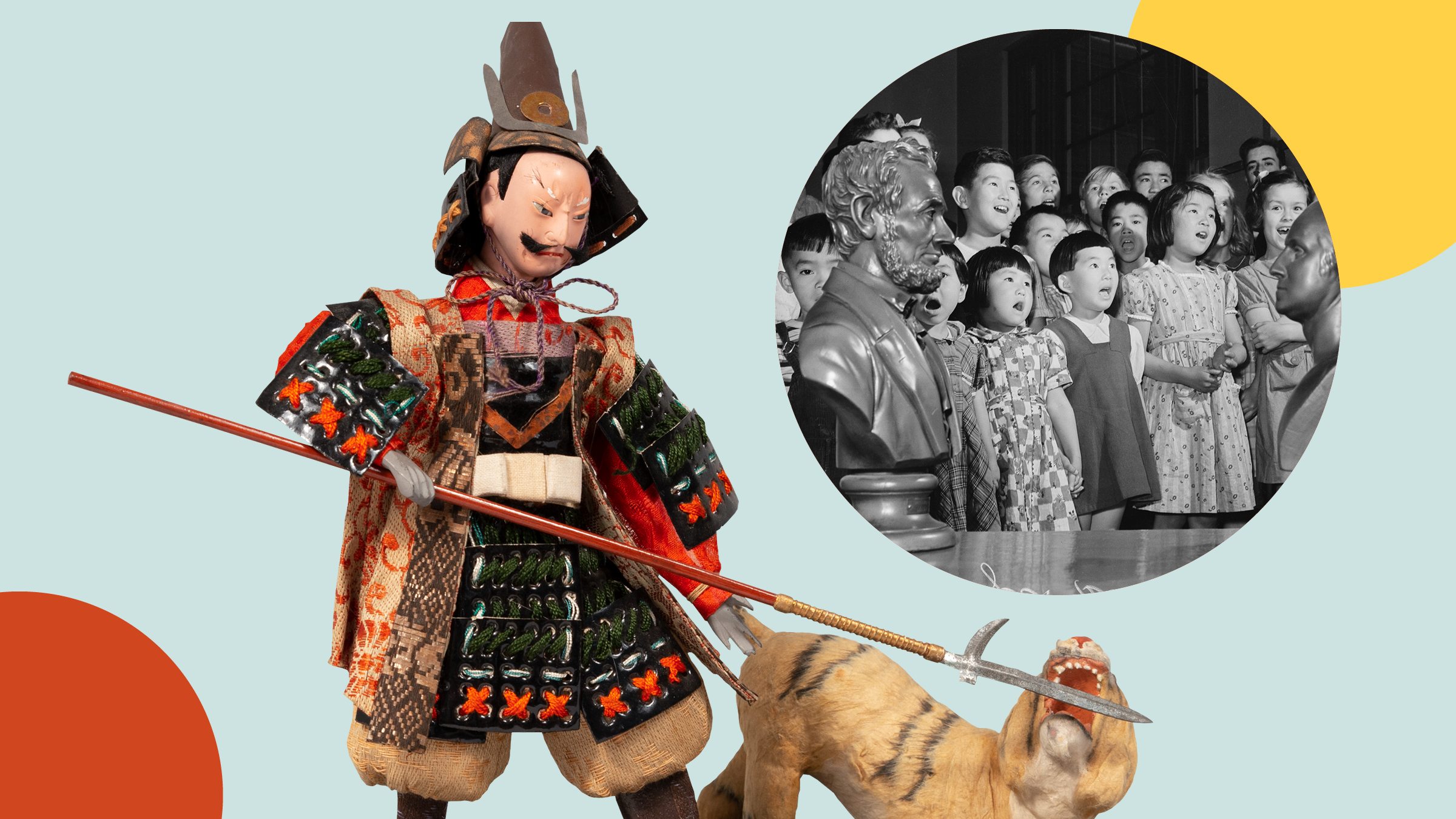 A doll in traditional Japanese armor fending off a tiger with a pike. Inset shows young school children singing adjacent to busy of Abraham Lincoln.