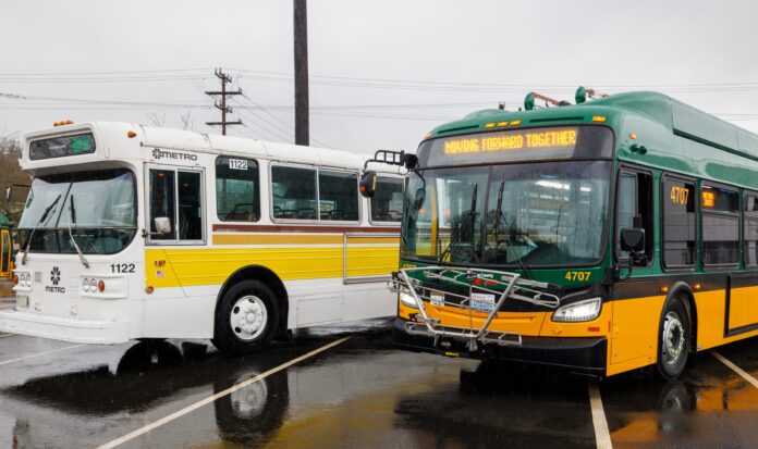 Two King Country Metro buses (one white and yellow