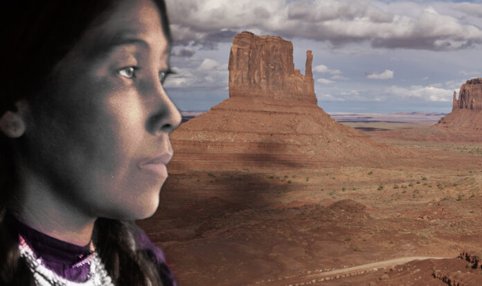 Native American gazes off to the right while