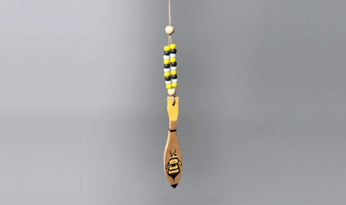 Wooden necklace craft with yellow