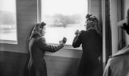 Ritsuko Terayama and Sumiko Furuta at window of ferry crossing Puget Sound, 1942.
