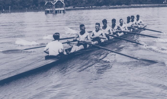 The University of Washington Men's Rowing Team on the water circa 1936.