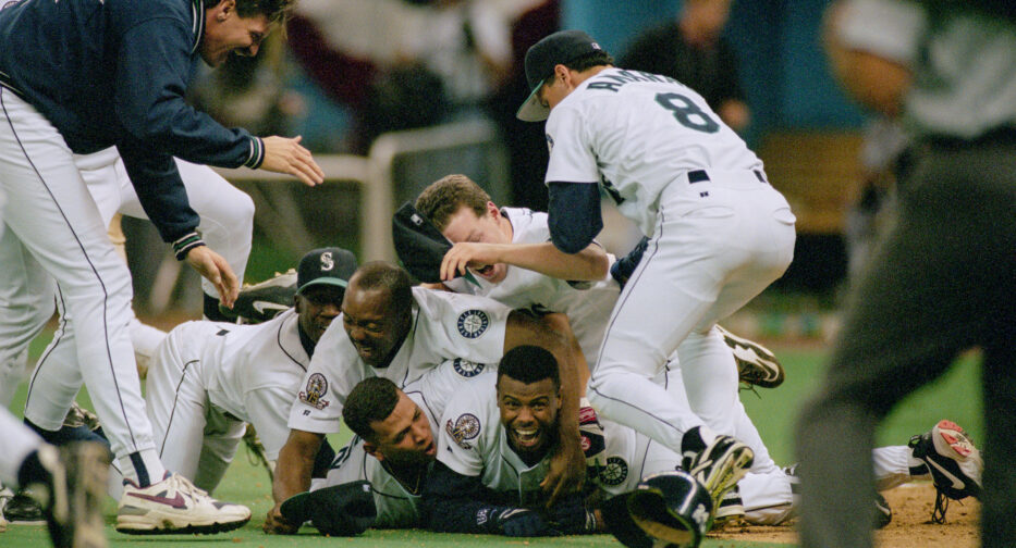 Ken Griffey Jr. scoring the winning run in Game 5 of the American League Division Series at the Kingdome, Seattle, October 8, 1995