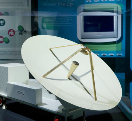 White satellite dish from the MOHAI Live Wires exhibit.