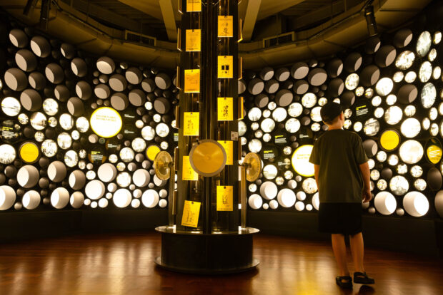 A boy explore the Bezos Center for Innovation at MOHAI in downtown Seattle, WA.