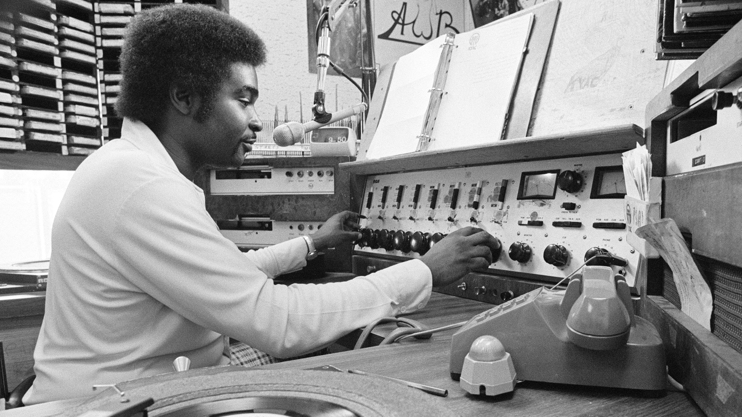 Robert L. Scott in booth at KYAC radio station
