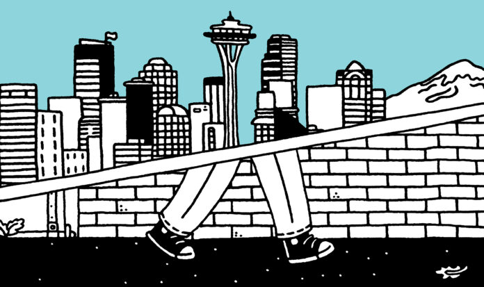 Upper half of image is Seattle skyline. Bottom have is legs walking on sidewalk.