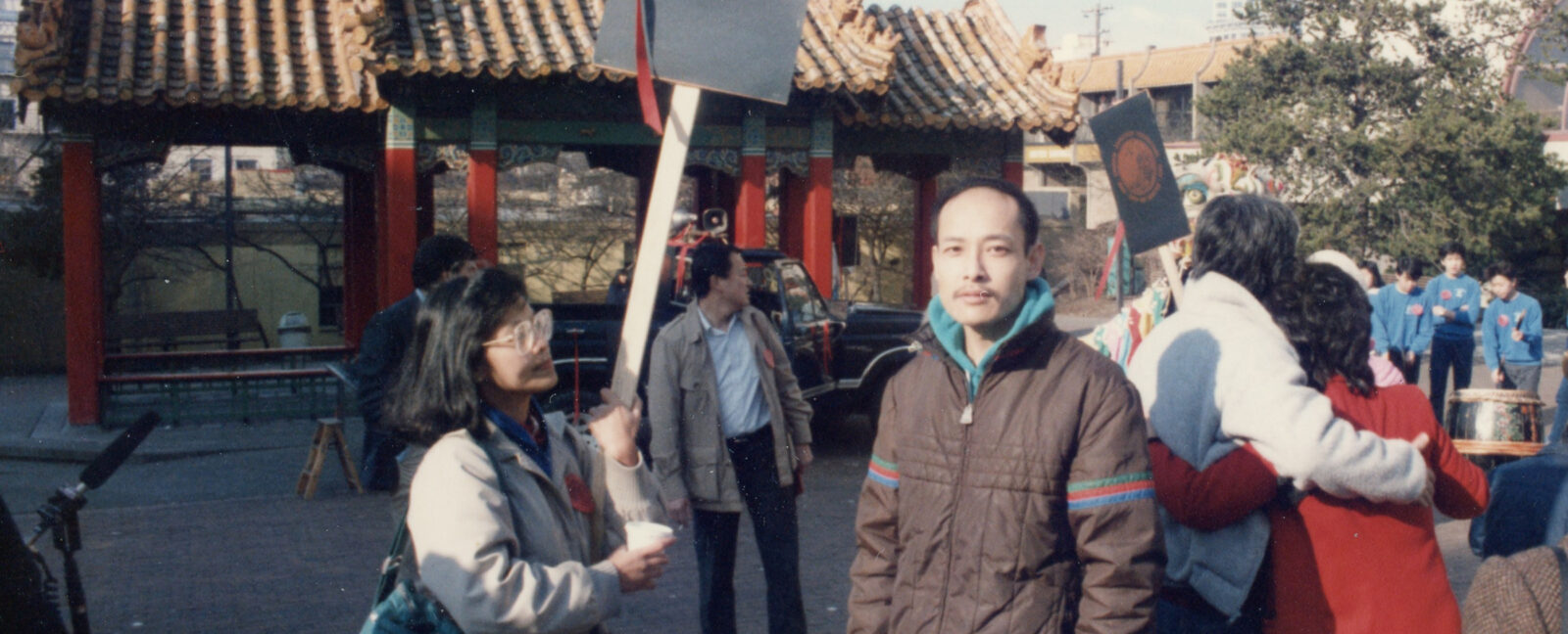 Ron Chew and Maria Batayola participate in a 1986 march commemorating the 100th anniversary of the Chinese expulsion from Seattle.