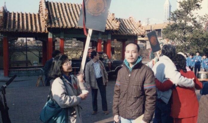 Ron Chew and Maria Batayola participate in a 1986 march commemorating the 100th anniversary of the Chinese expulsion from Seattle.