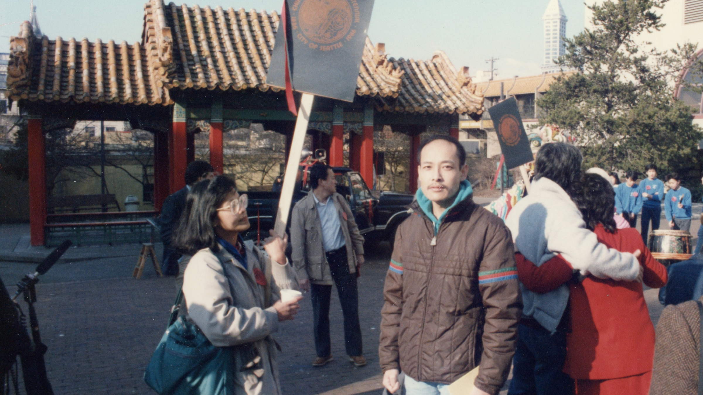 Ron Chew and Maria Batayola participate in a 1986 march commemorating the 100th anniversary of the Chinese expulsion from Seattle.