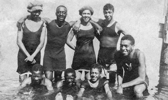 Ansel Adams: Group of African American swimmers.