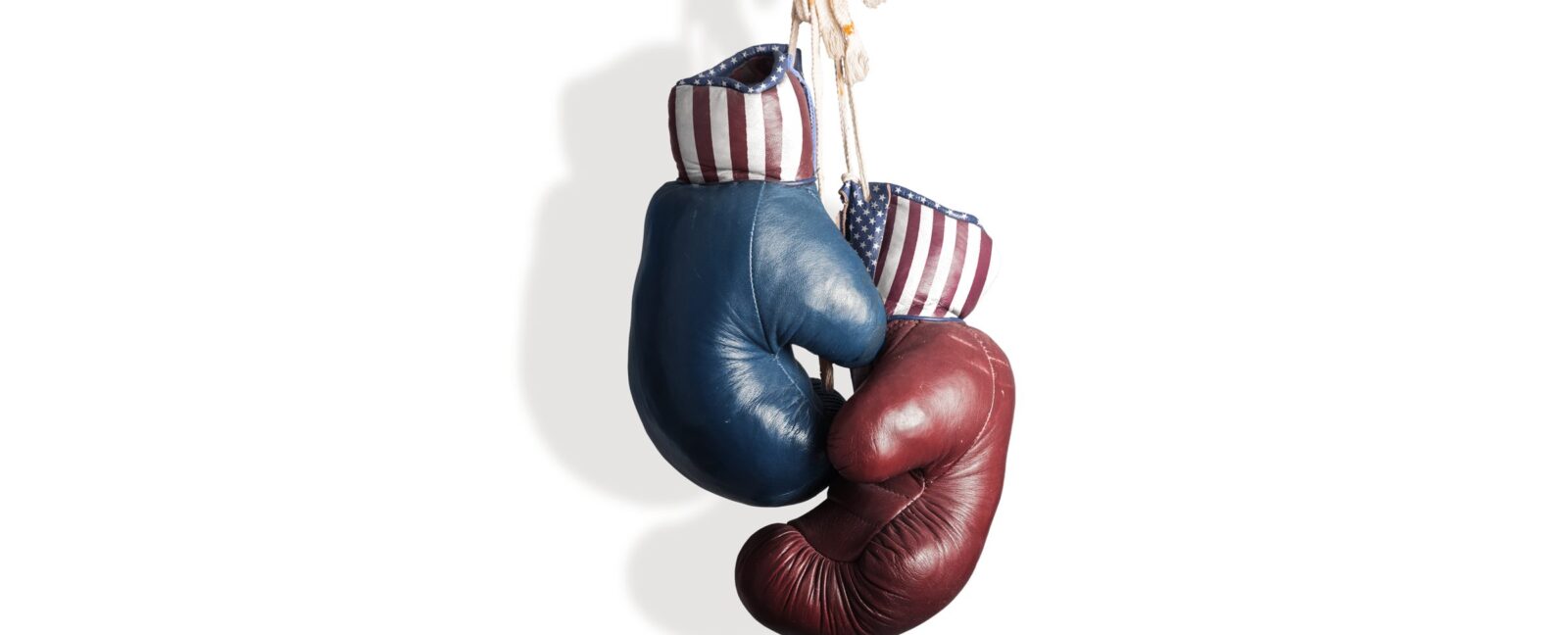 Hanging boxing gloves. One red
