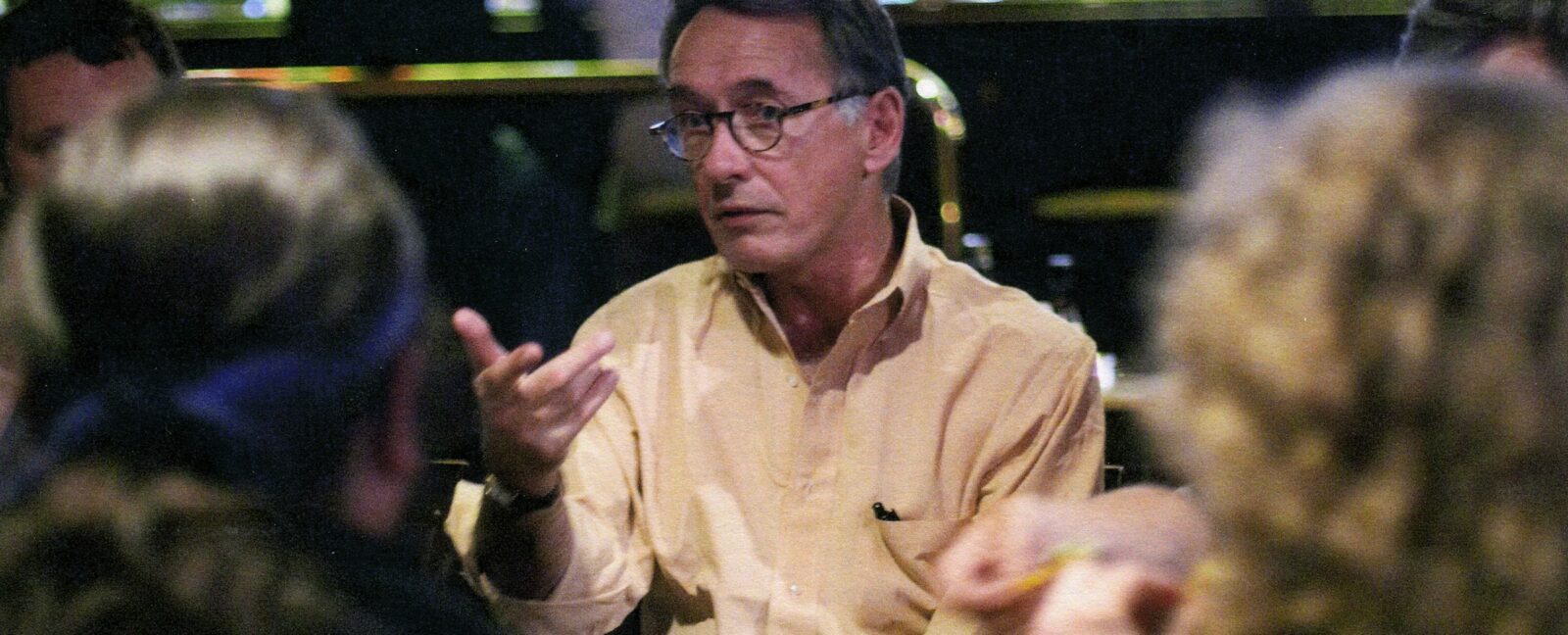 HistoryLink founder Walt Crowley speaks with a group.