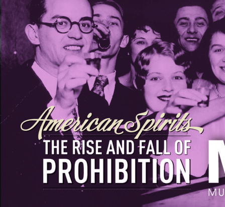 A group of individuals hold up their drinks during the prohibition period.