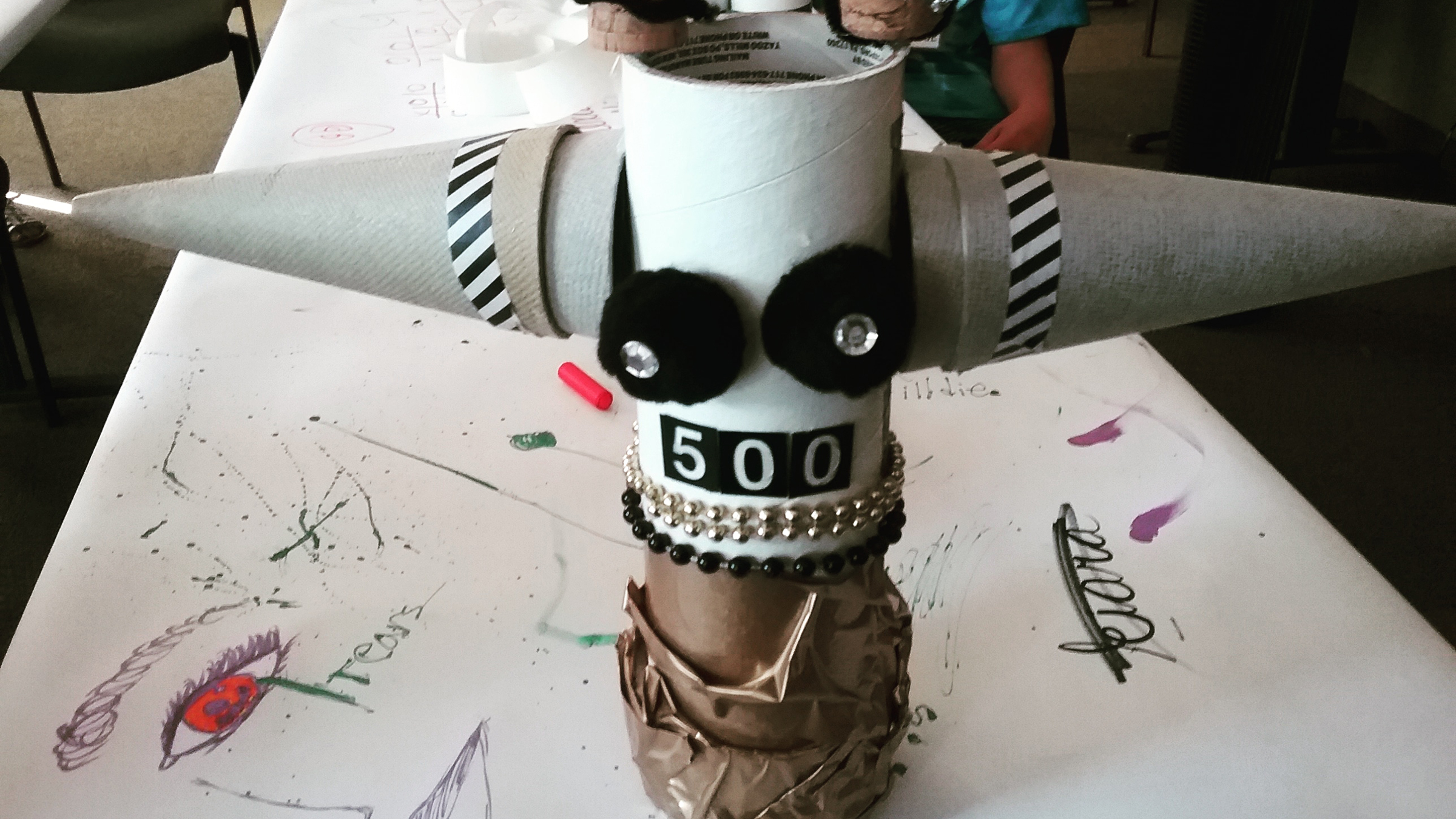 A Maker Day creation comprised of recycled paper products