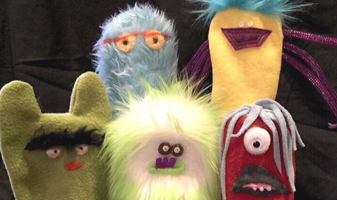 A collection of five Half Pint Puppets. One blue