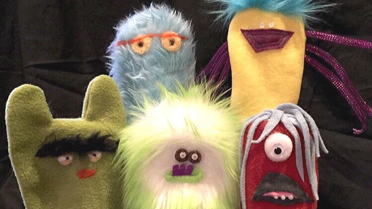 A collection of five Half Pint Puppets. One blue