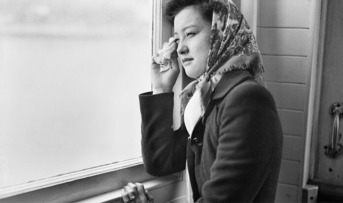 Mrs. Sumiko Furuta on ferry during forced removal