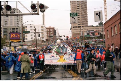Steelworkers marching to the waterfront in downtown Seattle, WA, December 1, 1999.