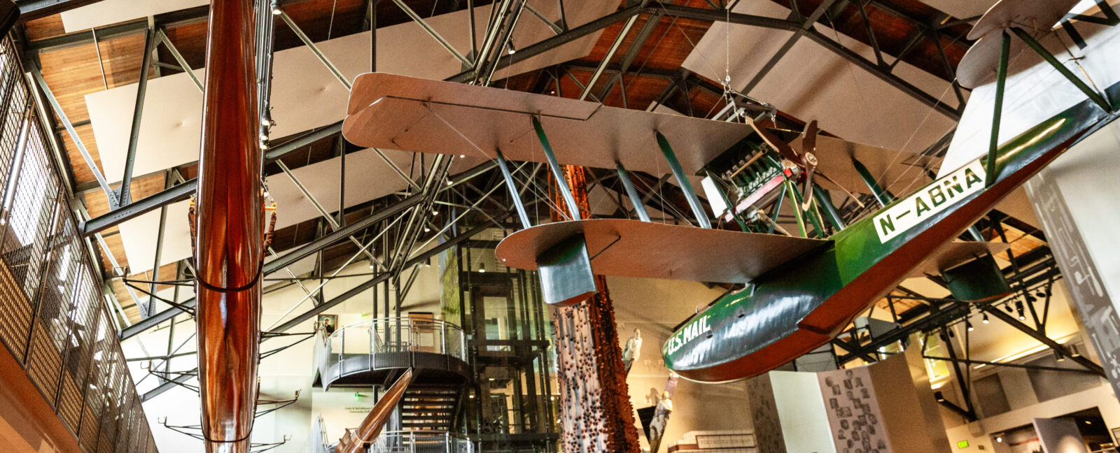 The iconic Boeing B-1 hangs over the Grand Atrium at MOHAI in downtown Seattle, WA.