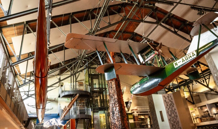 The iconic Boeing B-1 hangs over the Grand Atrium at MOHAI in downtown Seattle, WA.