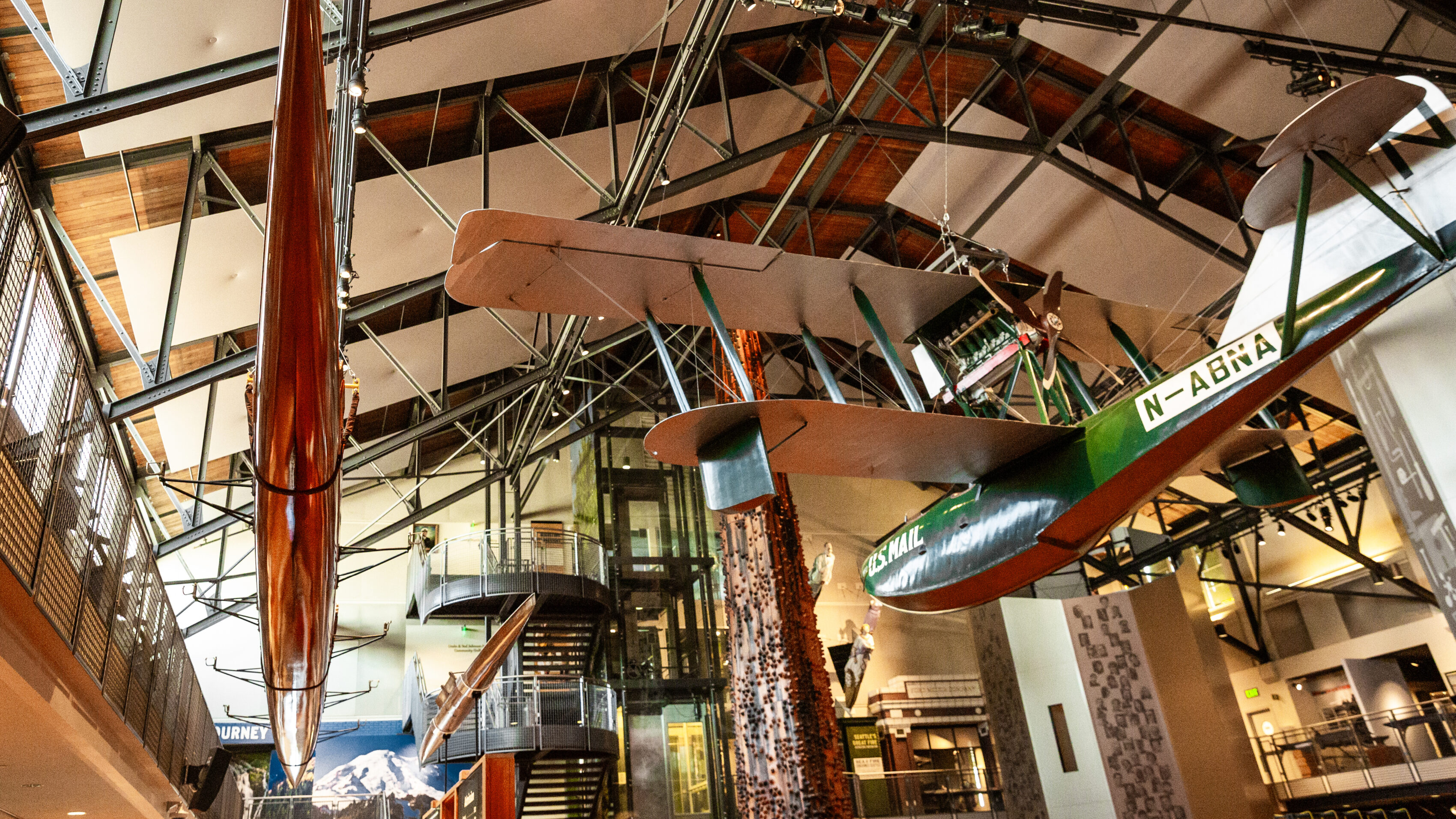 The iconic Boeing B-1 hangs over the Grand Atrium at MOHAI in downtown Seattle, WA.
