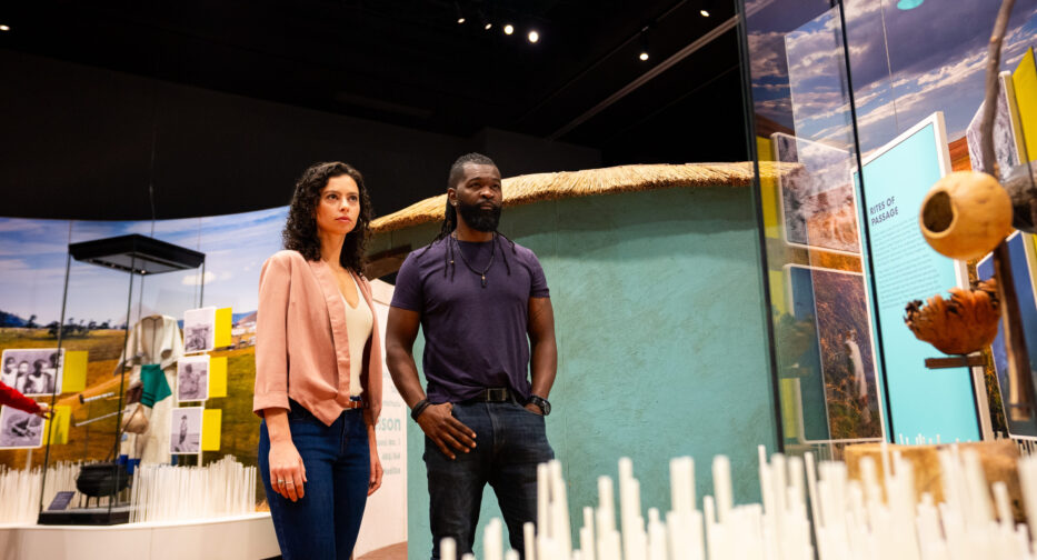 Visitors to the Mandela exhibit stand before a replica of Mandela's early home and explore the formative experiences that shaped his lifelong commitment to justice.