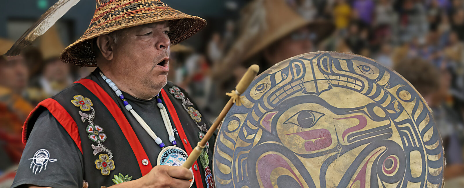 John Halliday playing a Native American drum
