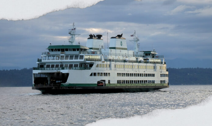 The ferry, "Suquamish", crosses Elliott Bay near Seattle, WA.