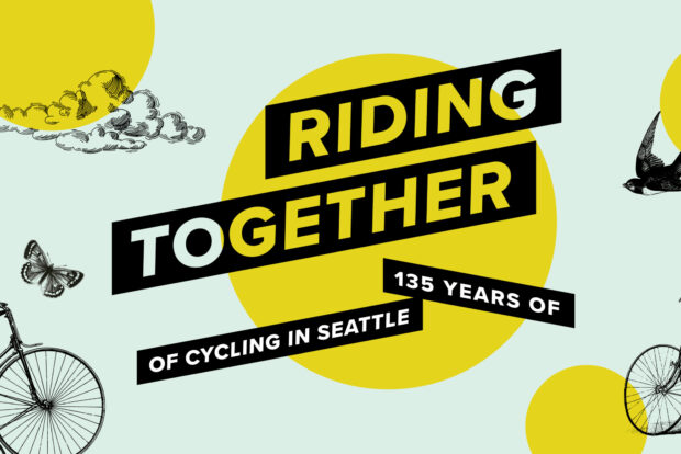 A group of cyclists pedaling off a ferry in Seattle, WA.