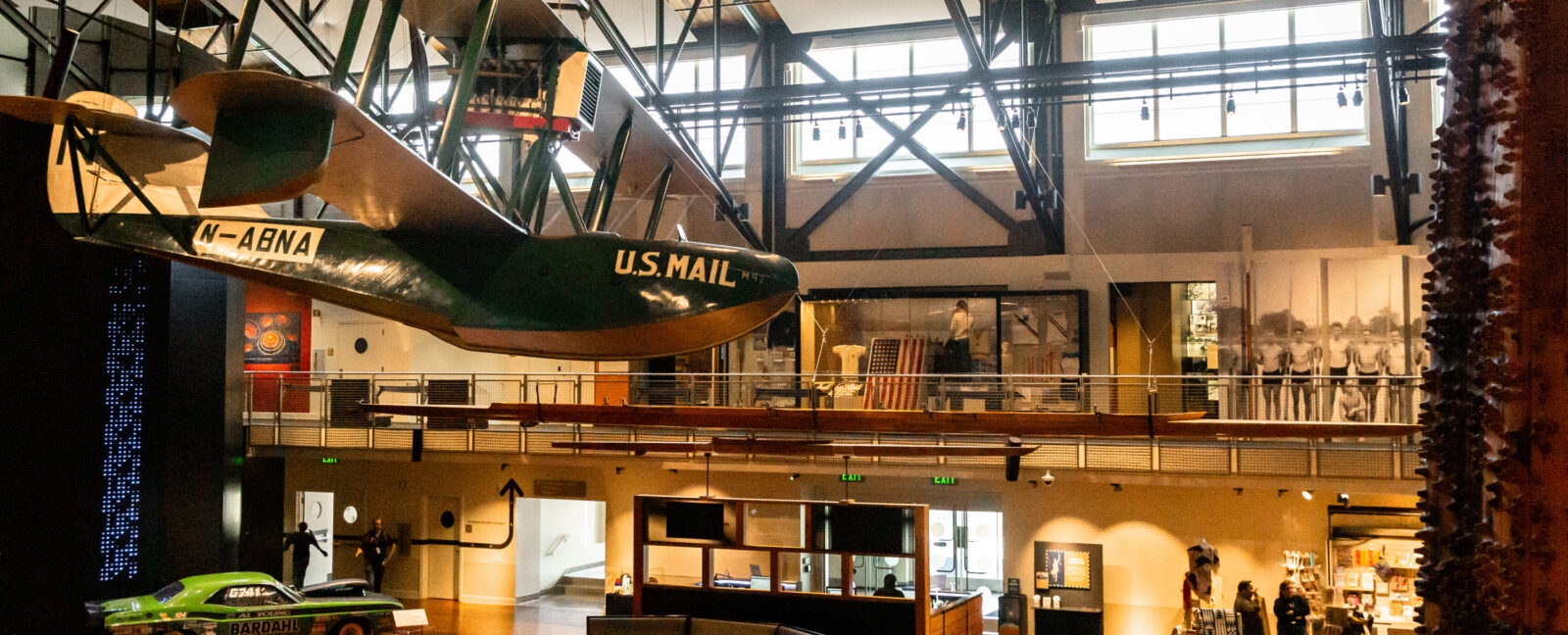 A view of the Grand Atrium at MOHAI with the Boeing B1 n the foreground and the Al Young's Dodge Charger in the background.