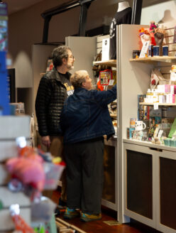 A couple shopping at the MOHAI Mercantile in downtown Seattle, WA.