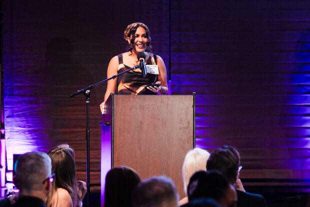 A speaker on stage at the 2024 MOHAI Gala.