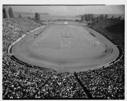 Aerial view of Husky Stadium during a football game, Seattle, September 29, 1945