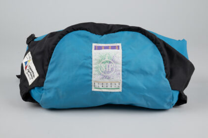 Teal-colored fanny pack with a logo that reads "1989 bicycle classic."
