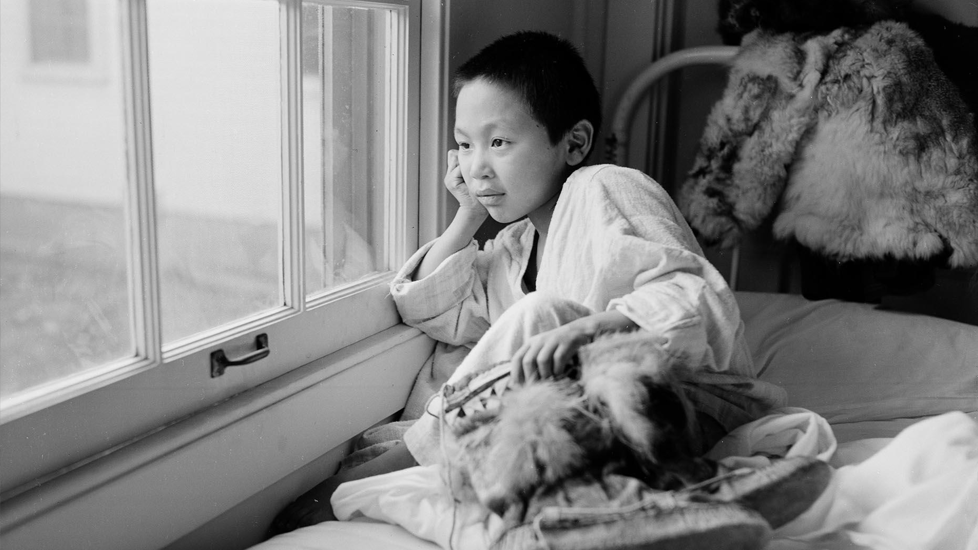Young patient looking out of window at Firland Sanatorium, Seattle, December 1, 1954