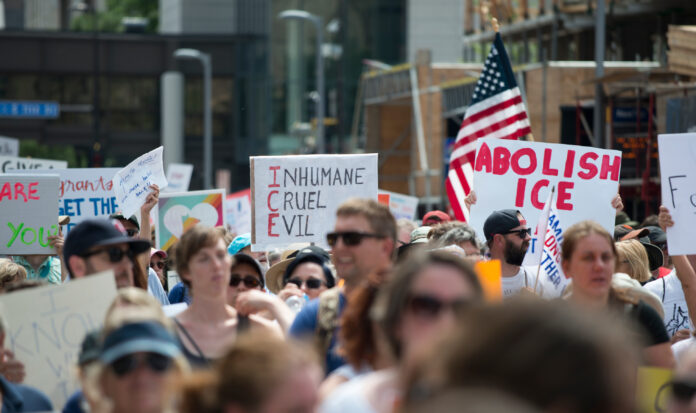 March and Day of Action in Minneapolis, Minnesota, June 30, 2018 with signs reading, "Free Our Future", "Families Belong Together", "Abolish ICE".