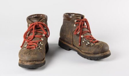 Pair of leather hiking boots purchased at REI, 1967 with red laces.